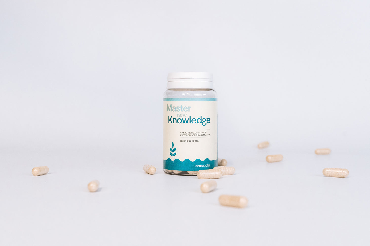 nooroots learning and memory nootropic supplement with capsules surrounding it